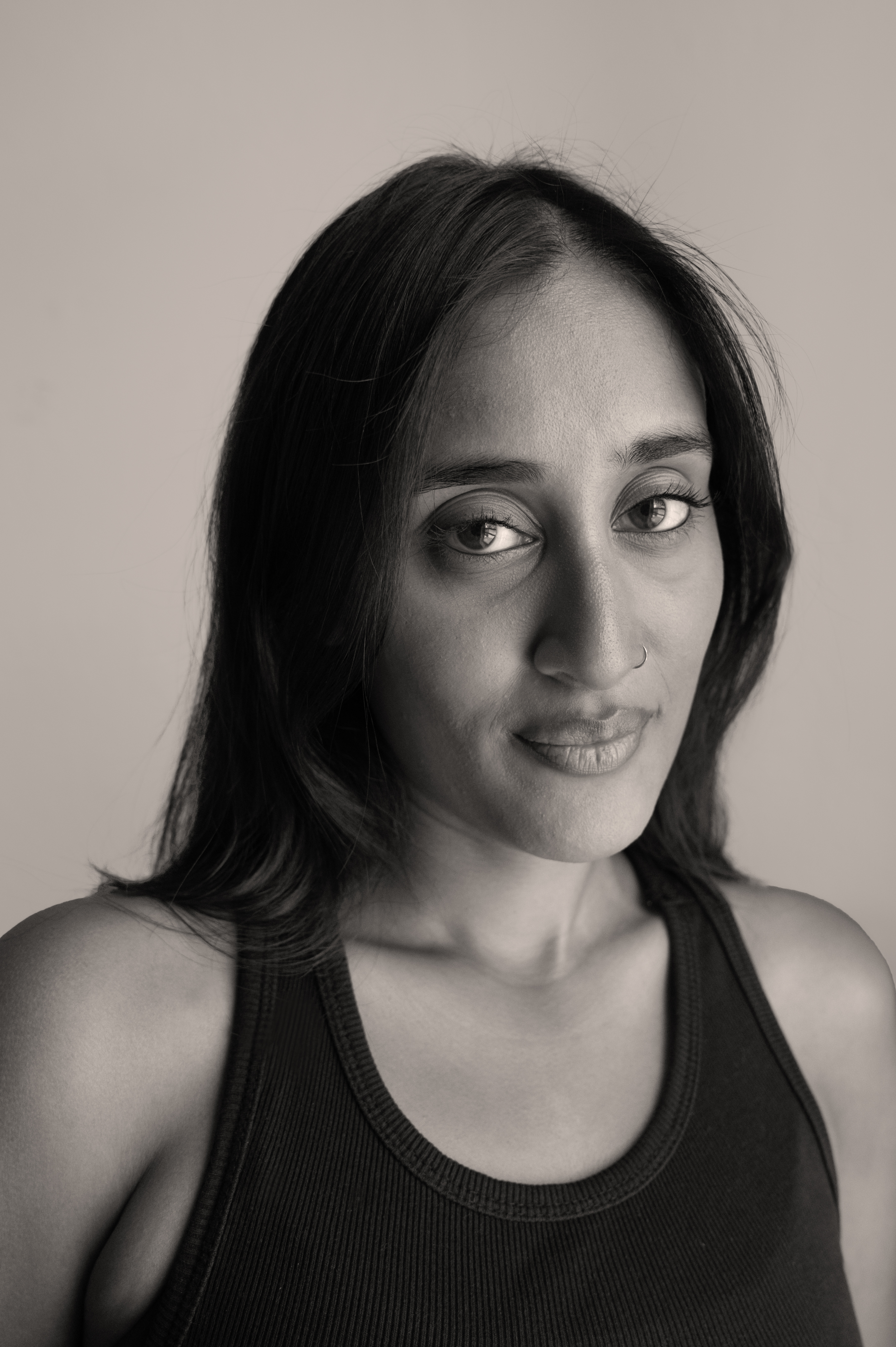 Black and white close-up headshot of Raagini Gupta