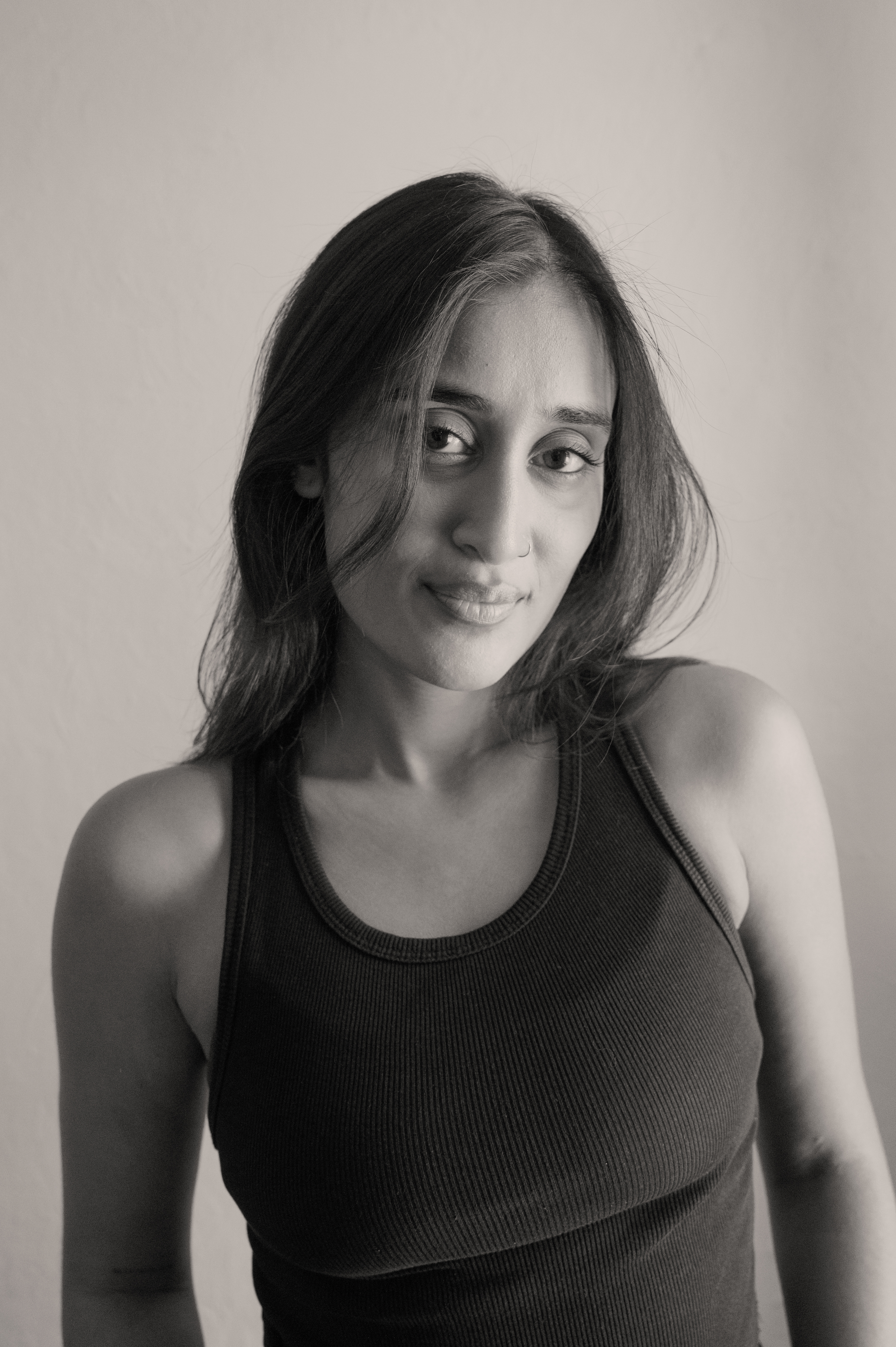 Black and white headshot portrait of Raagini Gupta