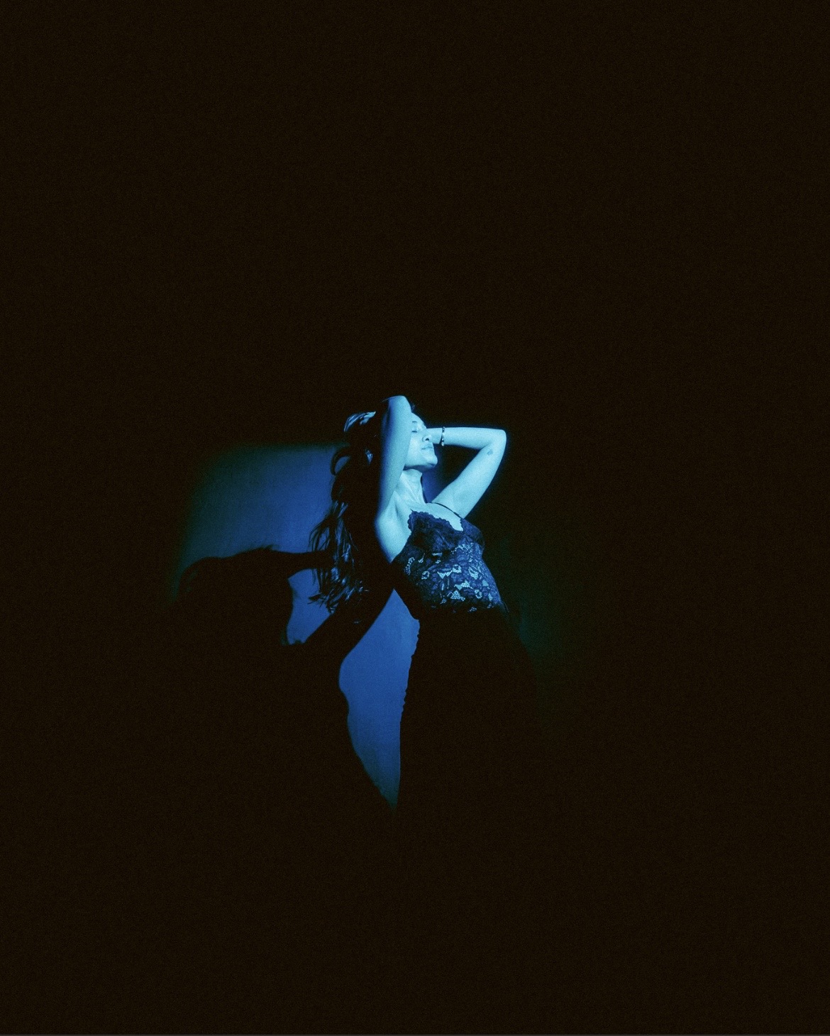 Raagini Gupta modeling in dramatic blue light for Terrance Yale