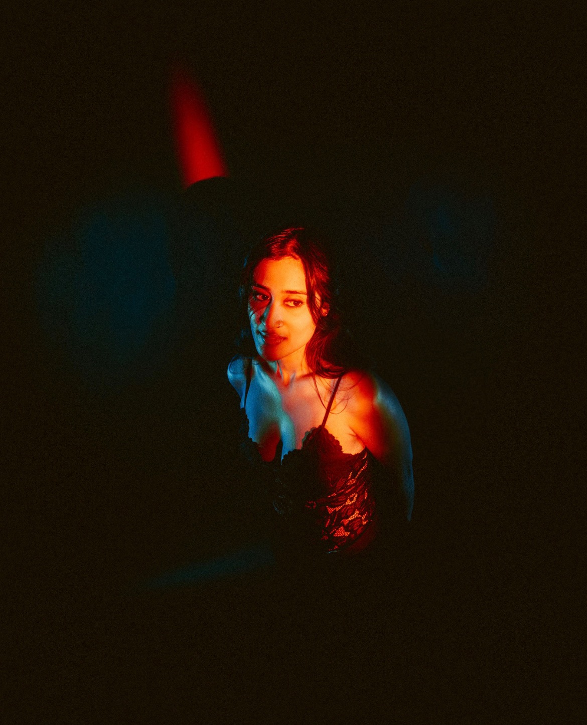 Raagini Gupta modeling in blue cinematic light and shadow